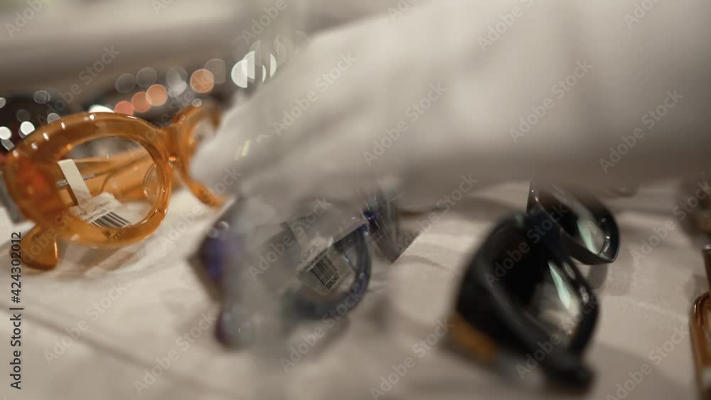 Ophthalmologist Hands Close Up Choosing Glasses Ophthalmologist Hands Close Up Choosing Glasses