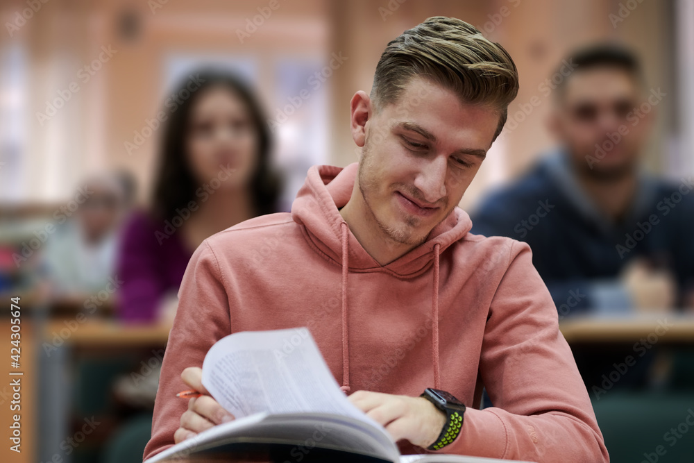 student taking notes while studying in high school student taking notes while studying in high school