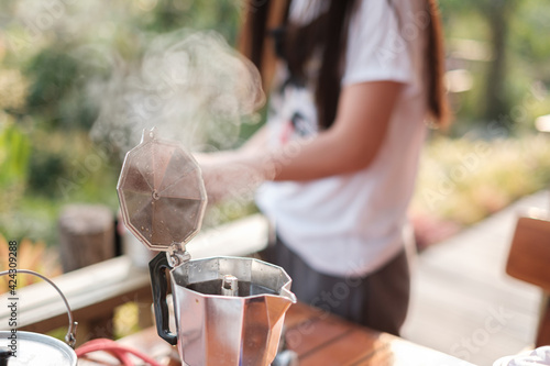 Travel, camping and dripping coffee in the mountains of northern Thailand in the morning with beautiful views.
 photo