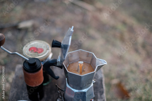 Travel, camping and dripping coffee in the mountains of northern Thailand in the morning with beautiful views.
 photo