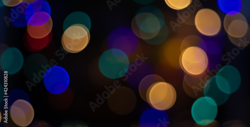 Abstract colourful glitter bokeh on circle theme background. 