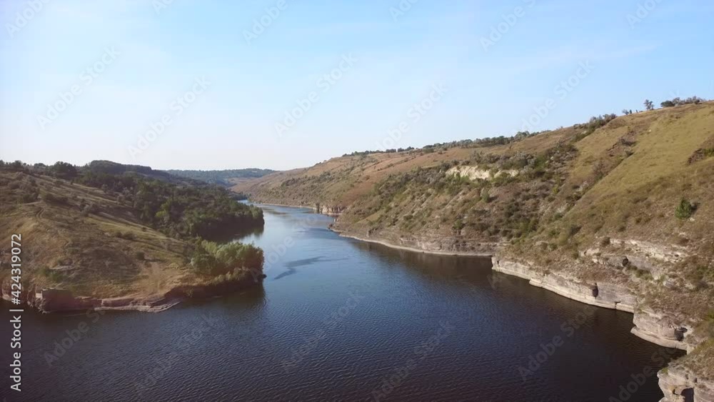 Panorama of rocky hills and winding river on sunny weather. Panorama of rocky hills and winding river on sunny weather.