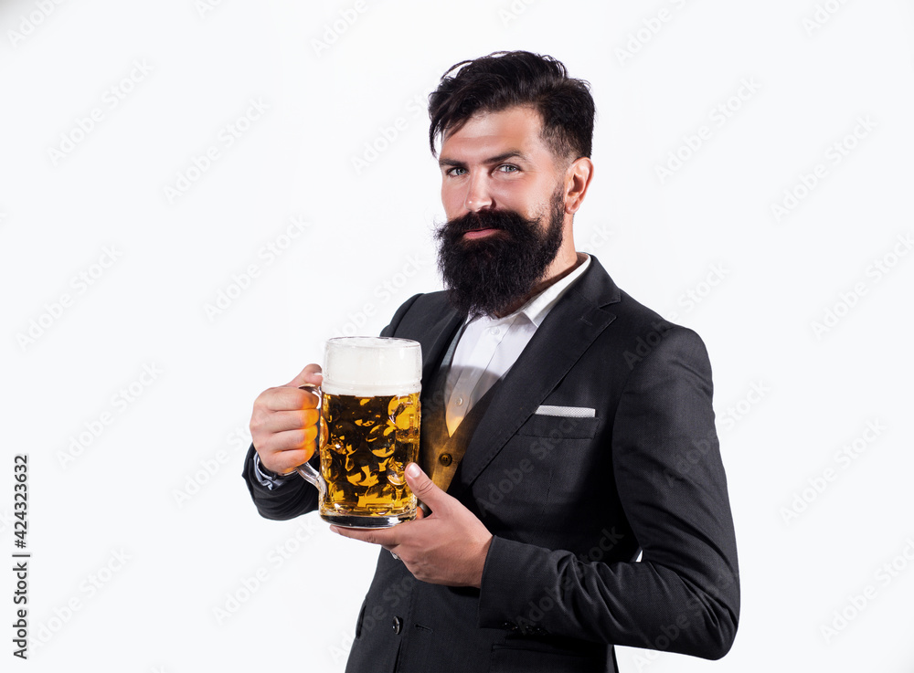 Serious man in classic suit drinking beer. Bearded guy in business outfit looks happy and satisfied. Portrait of man with lifted high glass of beer isoalted on white. Serious man in classic suit drinking beer. Bearded guy in business outfit looks happy and satisfied. Portrait of man with lifted high glass of beer isoalted on white.