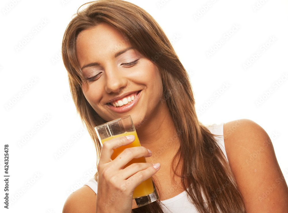 Healthy lifestyle - woman with orange juice on white background Healthy lifestyle - woman with orange juice on white background