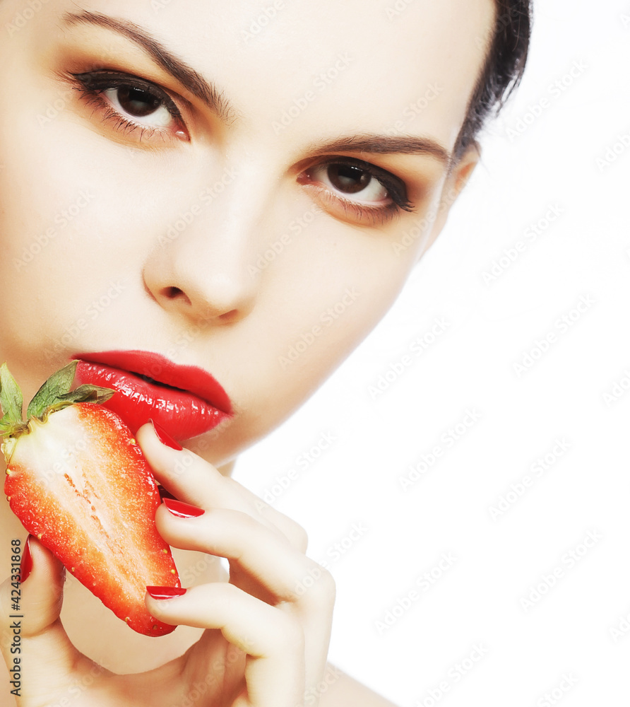 sexy lady holding a juicy strawberry sexy lady holding a juicy strawberry