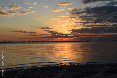 Sunset over the horizon. View from Indian beach  Sarasota  Florida  USA.