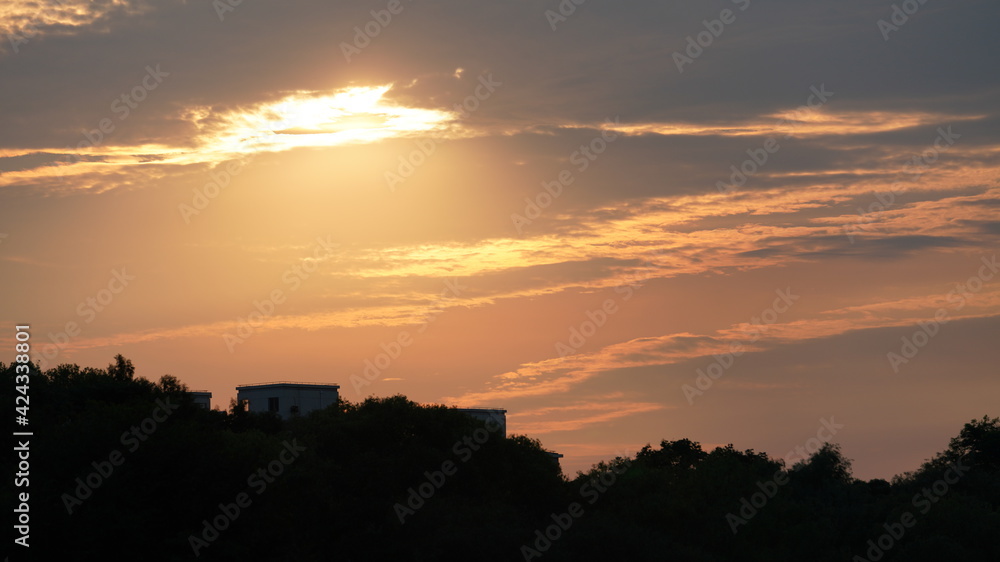 The beautiful sunset view in the city with the colorful clouds sky The beautiful sunset view in the city with the colorful clouds sky