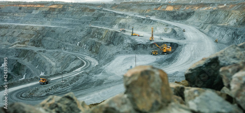 Work of heavy equipment in an open pit