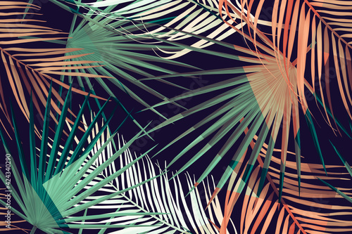 Seamless tropical palm leaves pattern photo