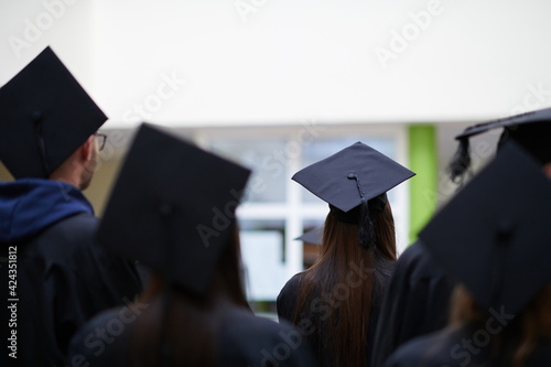 Group of diverse international graduating students celebrating