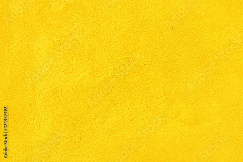 Yellow concrete wall texture background.