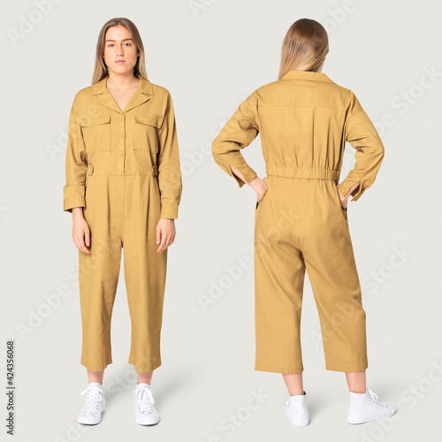 Valokuva Blonde woman in yellow jumpsuit with design space streetwear apparel full body