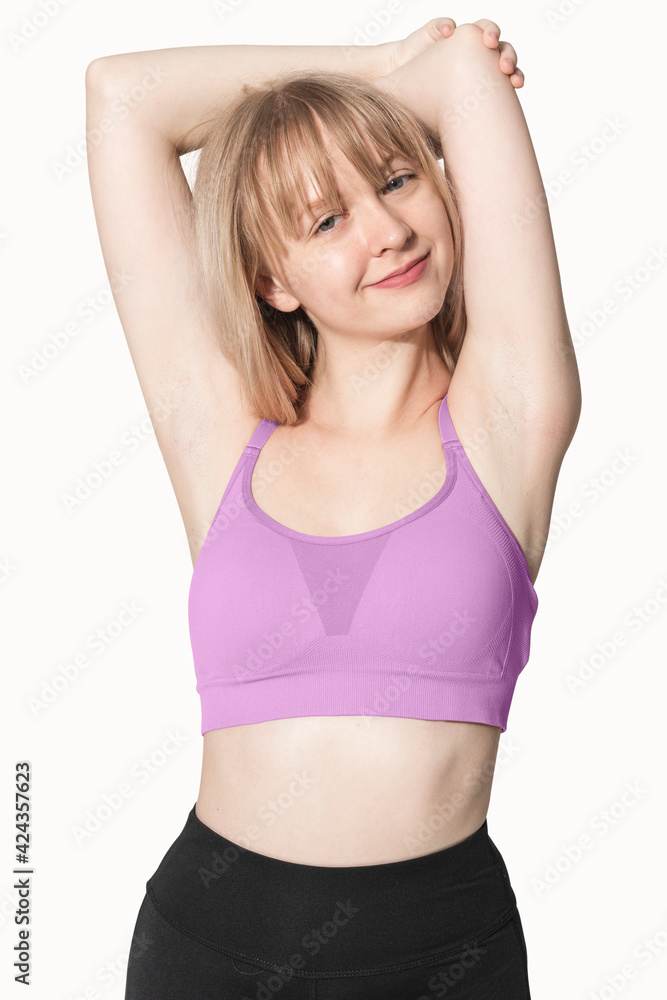 Blonde girl in pink sports bra for activewear photoshoot Blonde girl in pink sports bra for activewear photoshoot