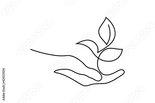Environment conservation icon in continuous line art drawing style. Plant in human hand as a symbol of nature protection and eco friendly consumption black linear design isolated on white background