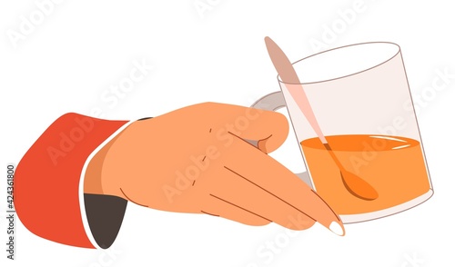 Hand holding cup of tea poured in glass mug vector