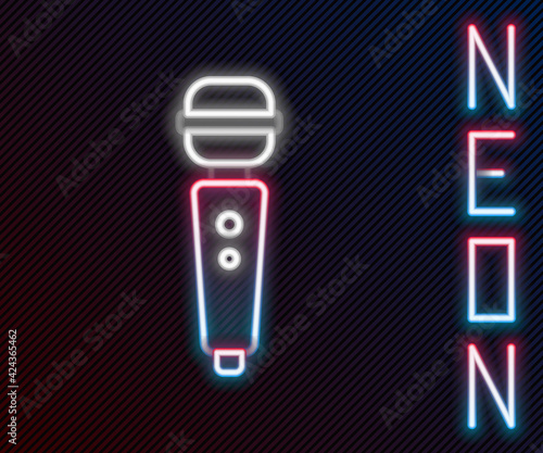 Glowing neon line Dildo vibrator for sex games icon isolated on black background. Sex toy for adult. Vaginal exercise machines for intimate. Colorful outline concept. Vector Illustration