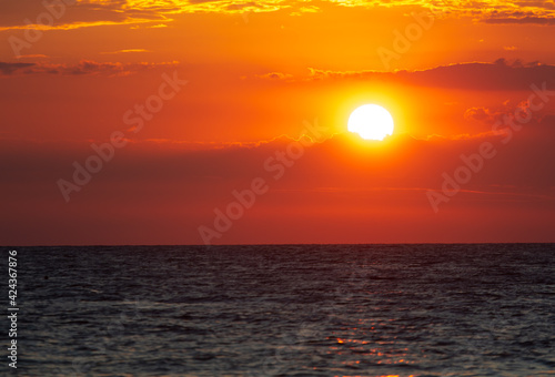 Horizon on the sea at sunset. © schankz