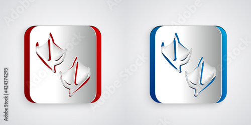 Paper cut Seagull paw footprint icon isolated on grey background. Paper art style. Vector