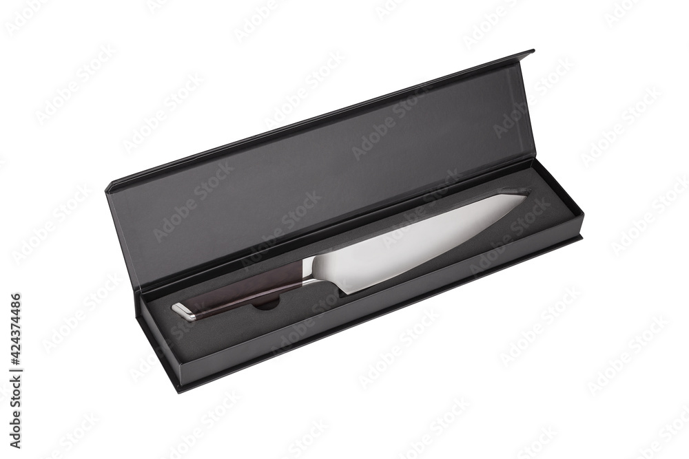 Carving knife with wooden handle in Black box isolated on white background. Knife for carving cooked meat into slices.
Carving knife with wooden handle in Black box isolated on white background. Knife for carving cooked meat into slices.