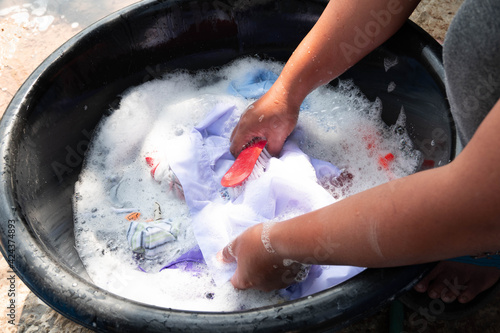 person washing dishes