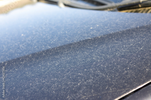 Vászonkép Image of a car body stained by yellow sand