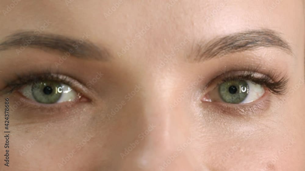 beautiful and green female eyes, close-up beautiful and green female eyes, close-up