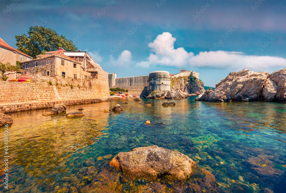 Сharm of the ancient cities of Europe. Sunny morning view of famous Fort Bokar in city of Dubrovnik. Captivating summer seascape of Adriatic sea, Croatia. Beautiful world of Mediterranean countries.