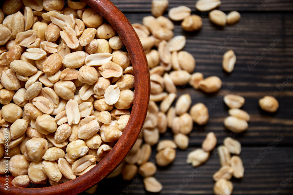 Nuts bowl on wooden background. Healthy vegan food. Nuts bowl on wooden background. Healthy vegan food.