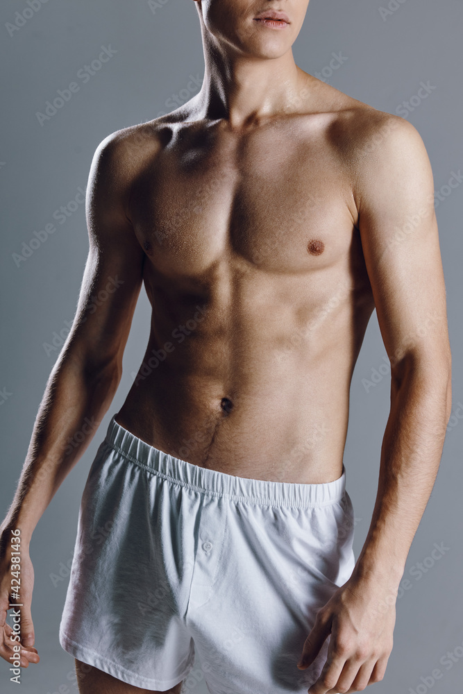 man athlete towel on shoulder gray background cropped view