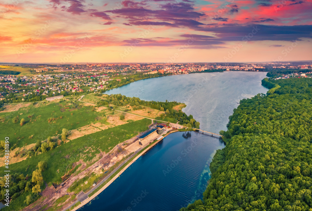Aerial landscape photography. Fantastic summer view from flying drone of Ternopil lake. Spectacular summer sunset on Seret river. Wonderful morning cityscape of Ternopil town, Ukraine, Europe.