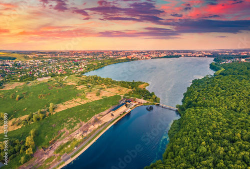 Aerial landscape photography. Fantastic summer view from flying drone of Ternopil lake. Spectacular summer sunset on Seret river. Wonderful morning cityscape of Ternopil town, Ukraine, Europe. © Andrew Mayovskyy