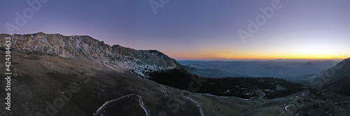 Wallpaper Mural 180 degree aerial drone shooting of the Madonie in winter with the rocky massif of Quacella. Sunset. Skiing at Piano Battaglia during the winter. Snow in Sicily. Madonie Park. Torontodigital.ca