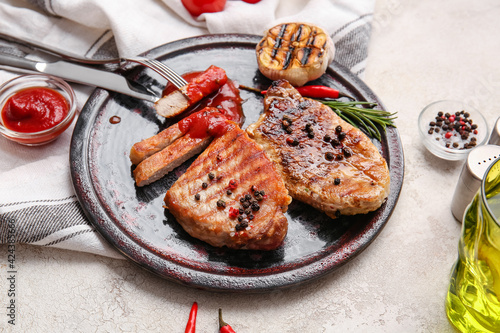 Grilled pork chops with ket...