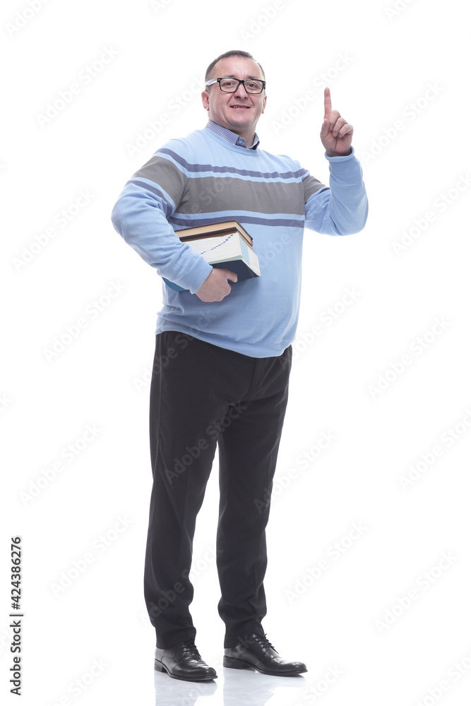 confident man with a stack of books giving a thumbs up confident man with a stack of books giving a thumbs up