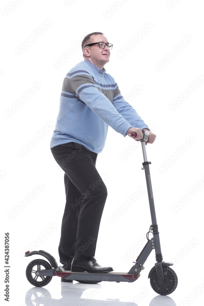 side view. successful modern man with electric scooter side view. successful modern man with electric scooter