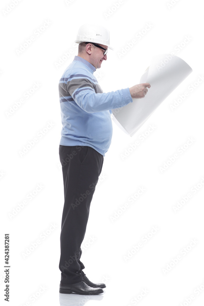 side view. smiling man reading the drawing side view. smiling man reading the drawing