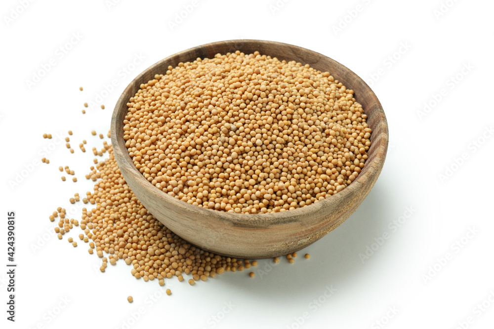 Wooden bowl with mustard seeds isolated on white background Wooden bowl with mustard seeds isolated on white background