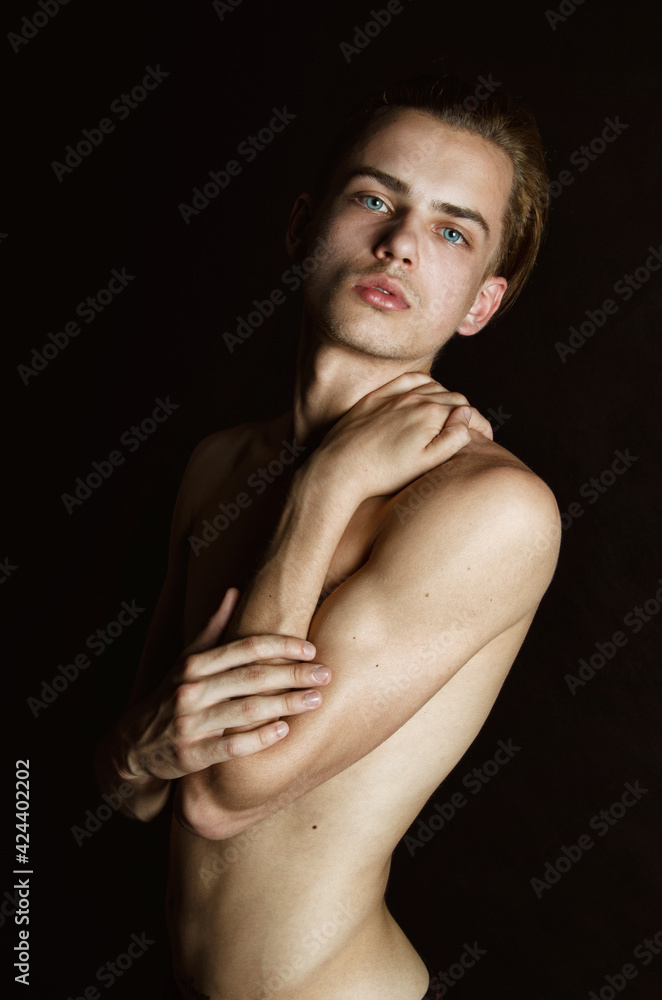 Portrait of a young attractive guy with blue eyes. Portrait of a young attractive guy with blue eyes.