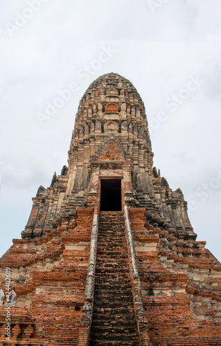 Remains of buddhahist temple in the historical sil of Ayutthaya Thailand. Chaiwayyhanaram temple travel in Thailand. © Mooam