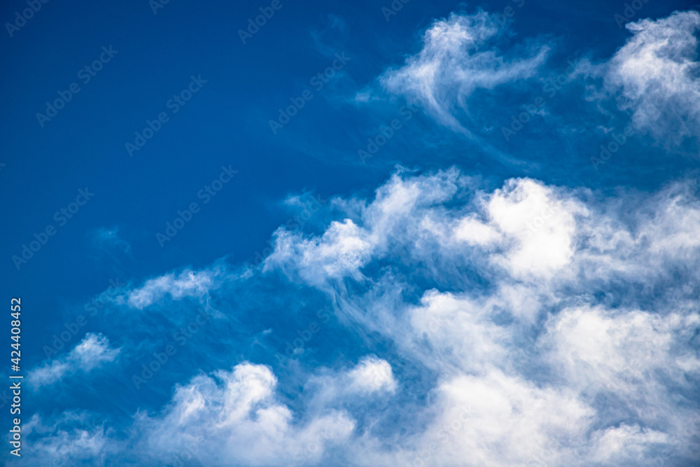 Obraz premium beautiful blue background with clouds and moon and clouds pattern.