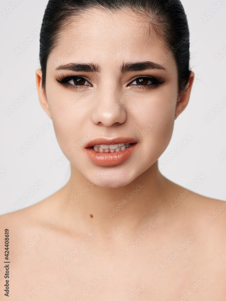 pretty woman emotions cosmetics face naked shoulders cropped view studio pretty woman emotions cosmetics face naked shoulders cropped view studio