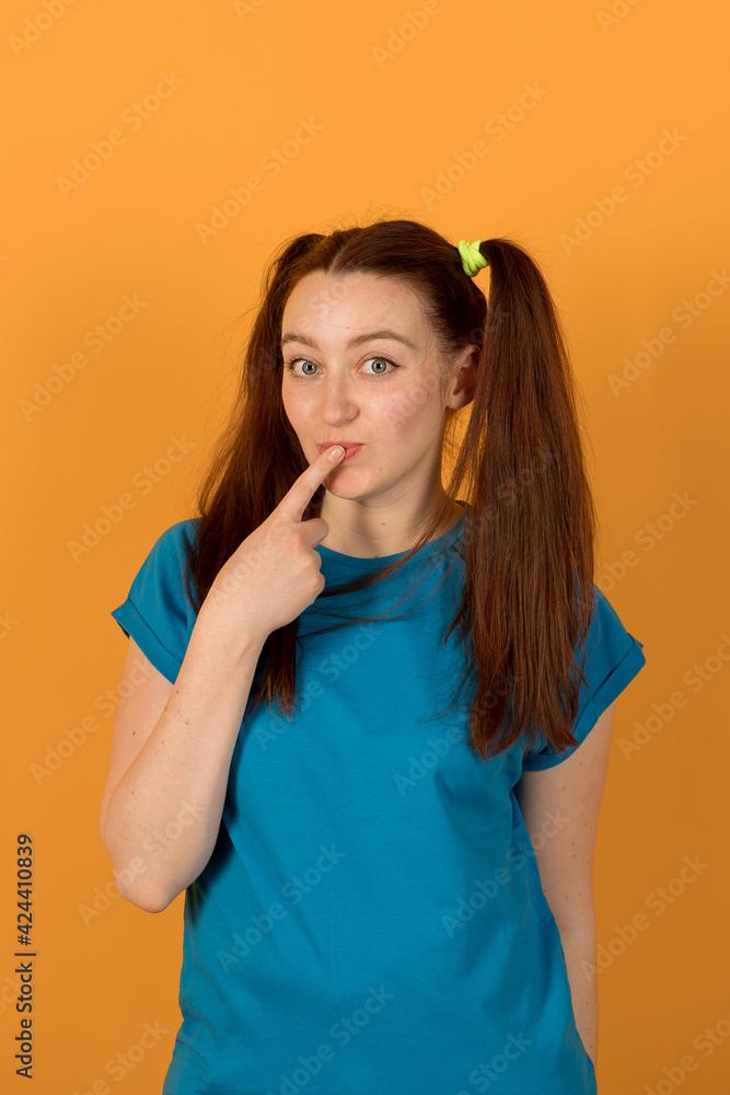 Happy girl on yellow background Happy girl on yellow background