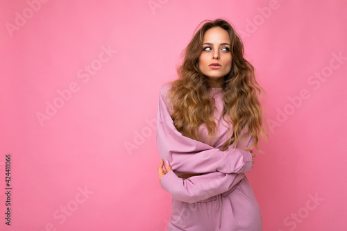 Close-up portrait of nice-looking attractive lovely lovable pretty cute winsome gorgeous cheerful cheery wavy-haired blonde woman isolated on pastel color background wearing stylish clothes