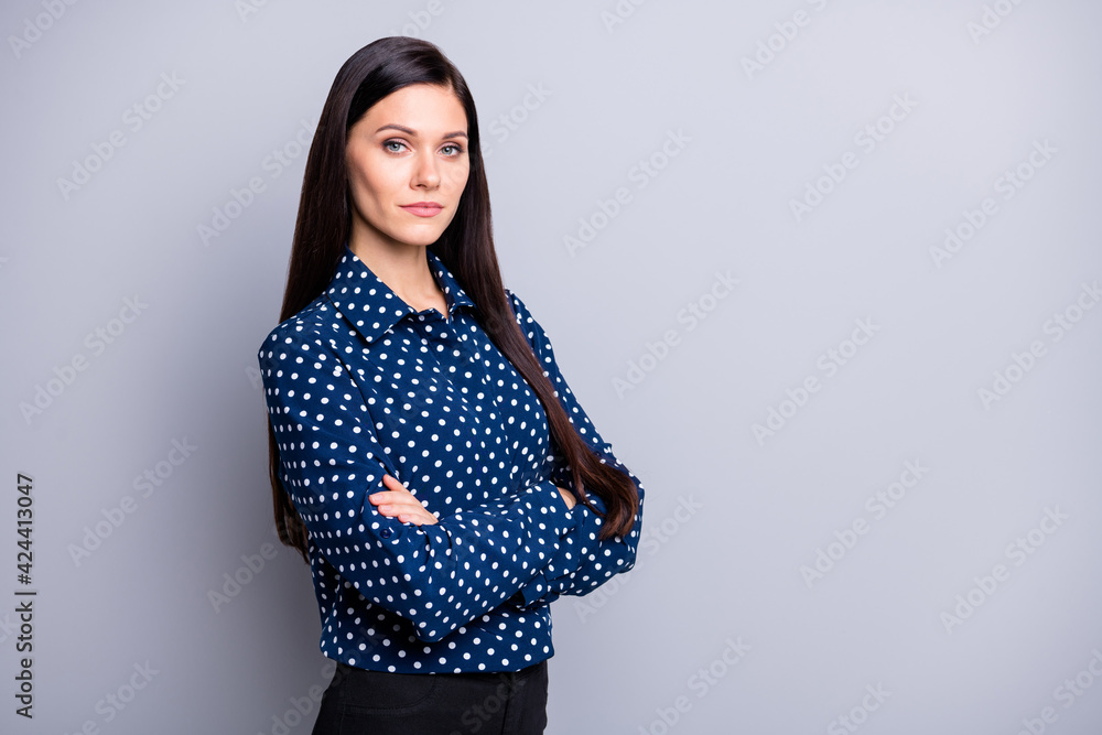 Photo of serious cute brunette girl crossed arms wear blue blouse isolated on grey color background Photo of serious cute brunette girl crossed arms wear blue blouse isolated on grey color background