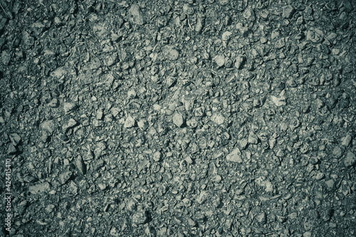 Zoom View Black and White Gravel or Pebble on Asphalt Road Texture Background with Natural Light