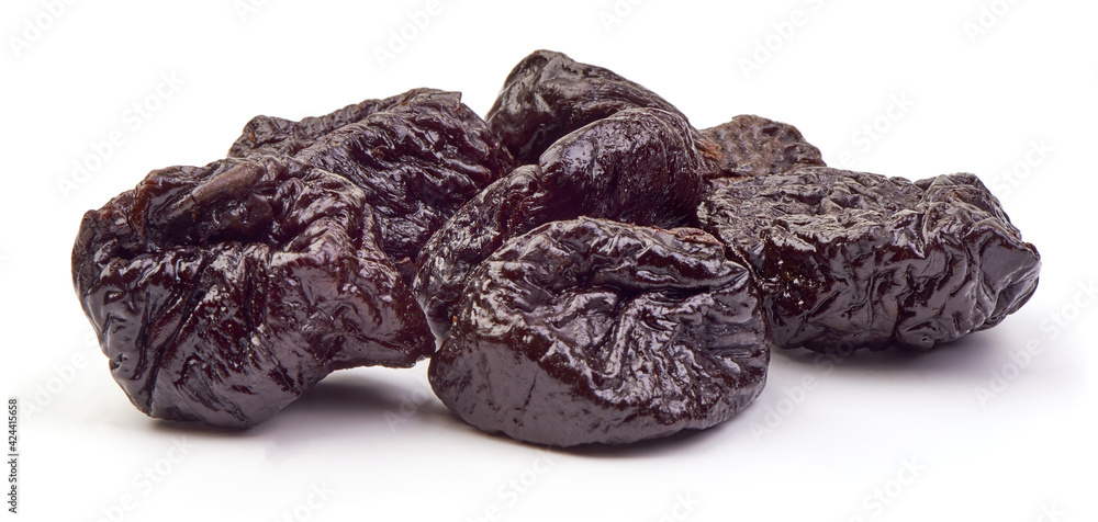 Prunes, close-up, isolated on white background Prunes, close-up, isolated on white background