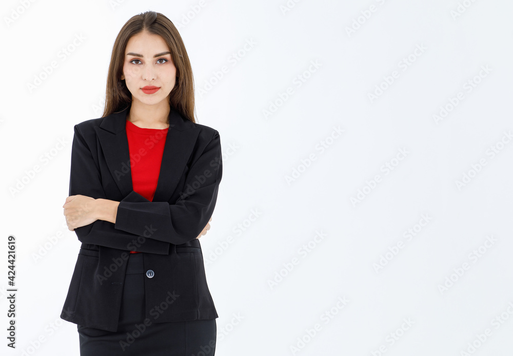 Portrait of cute mature businesswoman wearing black suit posing in professional confident with arms crossed, studio shot isolated on white background with copy space Portrait of cute mature businesswoman wearing black suit posing in professional confident with arms crossed, studio shot isolated on white background with copy space