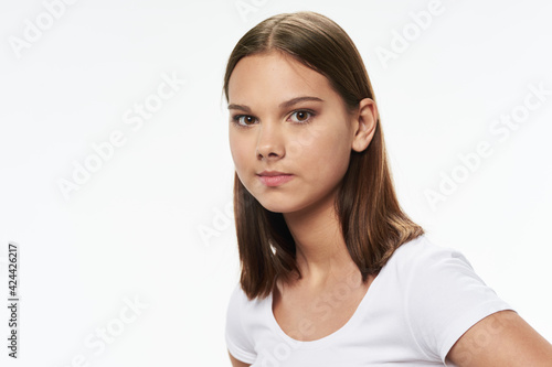 woman in white t-shirt attractive look clean skin isolated background
