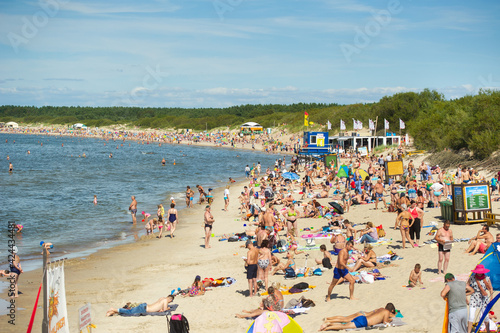 15 August 2017, Palanga, Lithuania. Crowded beach in summer hot bright summer day photo