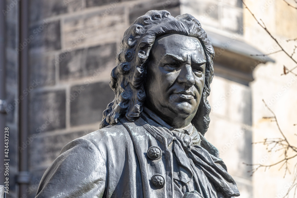 Leipzig, Saxony, Germany, 03-31-2021 Monument to the Thomaskantor and composer Johann Sebastian Bach in front of the Thomaskirche Leipzig, Saxony, Germany, 03-31-2021 Monument to the Thomaskantor and composer Johann Sebastian Bach in front of the Thomaskirche